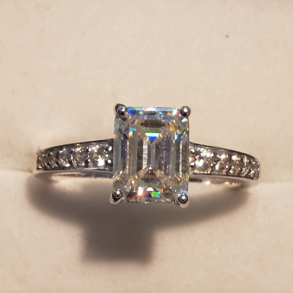 Strontium Titanate & White Zircon engagement ring